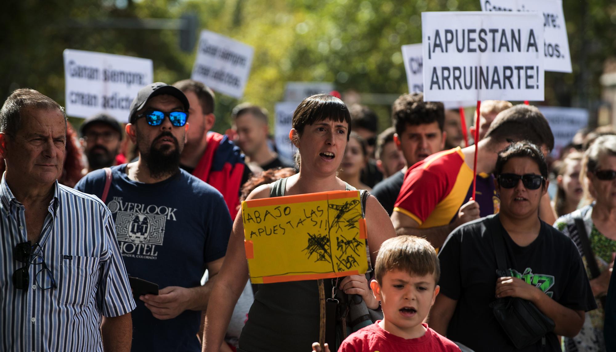 Manifestacion contra las casa de apuestas en el barrio de Tetuan, Madrid.