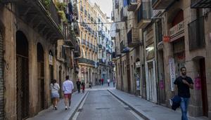Españoles por ley, extranjeros por piel