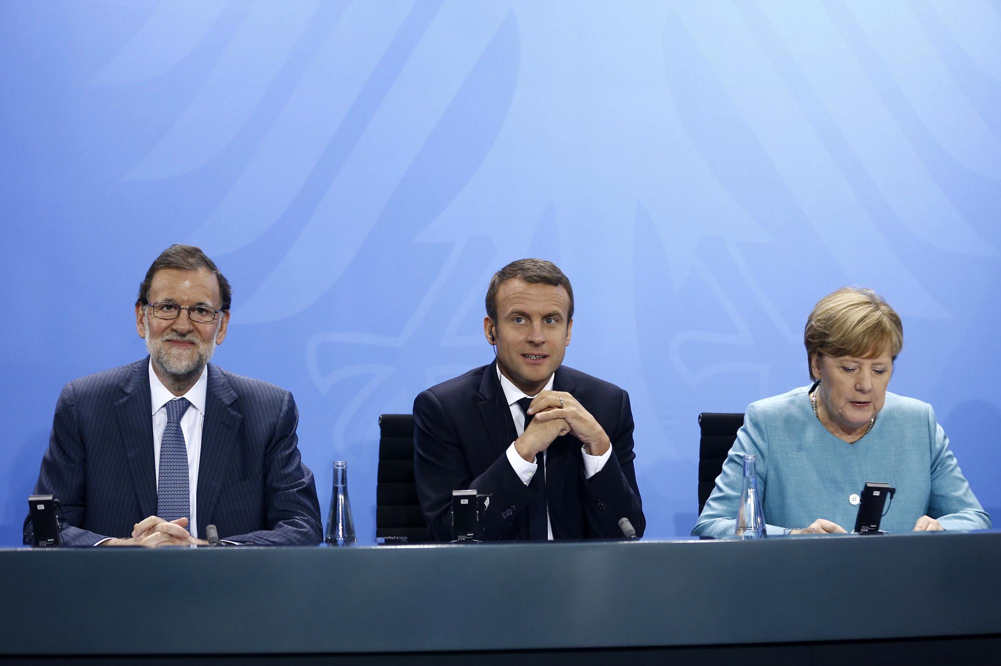 Rajoy Merkel Macron